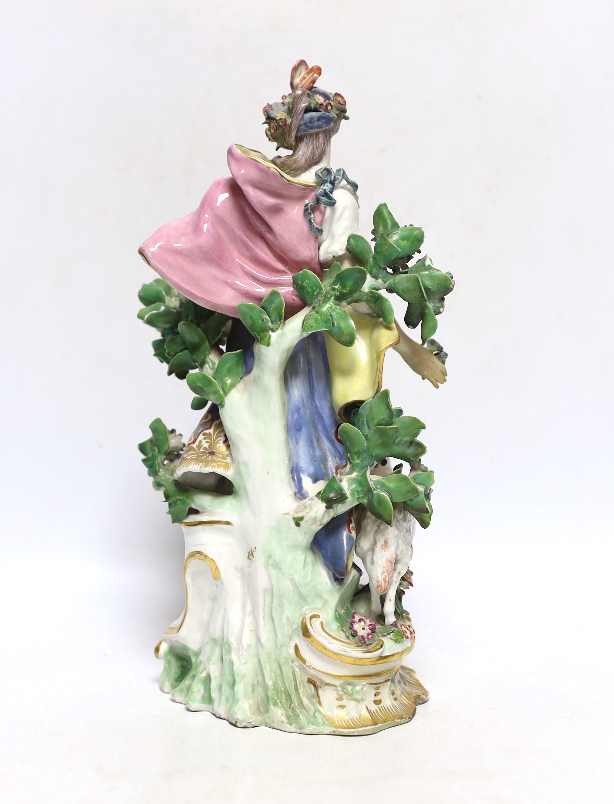An 18th century Chelsea /Derby figure, of a girl holding a lamb, gold anchor mark, 30cm high
